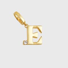 I am thrilled to be bringing this beautiful alphabet to our new 24K gold plated + Swarovski crystal charm collection. These gold-plated charms can easily be clipped on or off any one of our three choices of chain necklaces, our bangle bracelet, or our key chains. So you can have multiple letters one day (loving all your family!) or if someone is on the naughty list, they are simply removed!! Haha!he alphabet was created after I found two vintage tie pins in an antique store and they just happene Elegant Gold Charms With Logo, Elegant Gold Charm With Logo, Everyday Yellow Gold Jewelry With Logo Charm, Elegant Gold Logo Charm, Elegant Initial Pendant Charms, Gold Monogram Charms For Gifts, Gold Initial Pendant Charms, Elegant Yellow Gold Logo Charm, Yellow Gold Initial Pendant Jewelry With Logo Charm