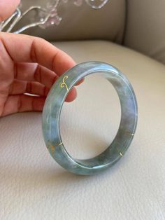 "🌈 Jade Bangle 59.3mm (2.33\"), Round Shape, Light Green & Light Lavender 🌷 Untreated Natural Jadeite/ Grade A Jade 🌷 Certified : Yes 🌷 Jade from Myanmar/ Burma 🌷 Shape : Round 🌷 Inner diameter : 59.3mm/ 2.33\" 🌷 Width & Thickness : 14 x 7.6mm 🌷 Color : Light Green & Light Lavender 🌷 Free standard shipping from Hong Kong with tracking included 🌷 Take approximately 7-21 days to arrive worldwide" Handmade Round Jade Bangle, Luxury Green Bracelets, Jade Bracelet Bangles, Jade Jewelry Design, Crystal Bracelets Diy, Ad Ideas, Green Lavender, Jewelry Ads, Light Lavender