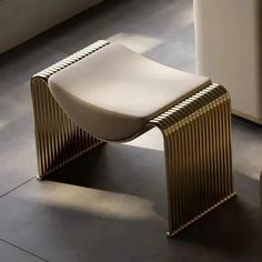 a white chair sitting on top of a tiled floor