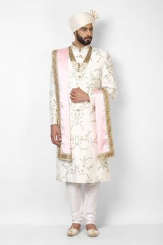 This item is made specially for you by hands with love  Item contains : Sherwani Pyjama  Pagdi Stole  Mala & Shoes  Fabrics :   Raw silk banaarsi  Colours :  White  Style and Designs :  Sherwani has mandarin collar and long sleeves with a full button placket symmetric hem and multiple slits Hand embroidery zardozdi work all over the sherwani and has embroidery work on collar and sleeves  White coloured solid churidar has a drawstring closure with nara  White turban and stole make the entire gest Long Sherwani With Resham Embroidery, Groom's Sherwani With Resham Embroidery For Eid, Traditional Long Wear For Groom On Eid, Semi-stitched Sherwani With Dupatta For Ceremonial Occasions, Long Sherwani With Dupatta For Eid, Groom's Sherwani With Dupatta For Eid, Ceremonial Long Sherwani With Dupatta, Festive Groom Sherwani With Dupatta, Traditional Wear For Groom With Dupatta For Eid