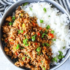 a bowl filled with rice and ground beef