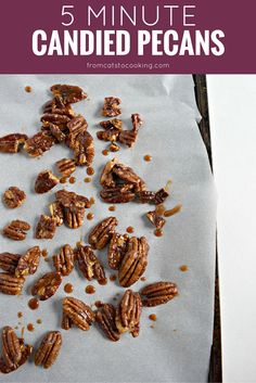 a bunch of pecans sitting on top of a piece of paper with the words 5 minute candied pecans