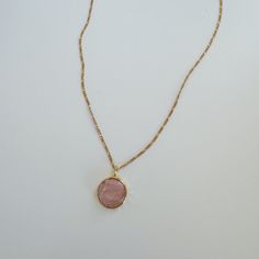 Elevate your style with our elegant rose quartz necklace. Perfect for the minimal and girly gal, this necklace exudes a subtle beauty that will make any outfit stand out. Let the calming energy of rose quartz inspire you to radiate confidence and grace. 18k Gold Filled, Brass, Rose Quartz Size: Chain- 18in w/ extender pendant- 23mm Tarnish-resistant, water resistant, and safe for sensitive skin Feminine Delicate Chain Necklace, Chic Gold Necklaces With Gemstone, Chic Gold Necklace With Gemstone, Feminine Pink Rose Quartz Jewelry, Dainty Pink Charm Necklace With Delicate Chain, Elegant Pink Charm Necklaces With Delicate Chain, Elegant Pink Charm Necklace With Delicate Chain, Feminine Gold Necklace With Gemstone, Feminine Gold Gemstone Necklace