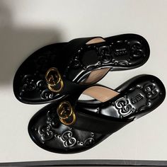 Beautiful Decoration And Can Be Worn In Any Occasion! Excellent Condition, Almost Never Worn! Gucci Black Sandals With Single Toe Strap, Designer Leather Slides With Single Toe Strap, Designer Closed Toe Sandals With Leather Footbed, Luxury Leather Sole Slides With Round Toe, Luxury Slides With Leather Sole And Round Toe, Luxury Slides With Round Toe Leather Sole, Designer Sandals With Cushioned Footbed And Single Toe Strap, Gucci Leather Sandals With Branded Heel Counter, Gucci Luxury Sandals With Leather Sole