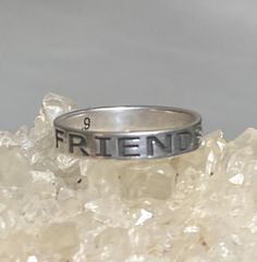 Friends Forever ring Friendship band sterling silver women girlsSize  8.75 Between a size 8.75 and a size 9Weight  8g  Widest part of band       5/8"Thinnest part of band    3/8"Free Shipping & Free Postal Insurance Delivered in a Gift Box If you do not want the ring polished and want to leave the natural patina please let me know at the time of purchase as I do polish rings before I ship rings out. ThanksFree First Class shipping and postal insurance is included. If you want to upgrade to p Silver Stackable Promise Rings Stamped 925, Silver Stackable Rings For Promise, Stamped 925, Silver Vintage Jewelry For Friendship, Promise Stackable Rings Stamped 925, Silver Stackable Jewelry For Friendship, Meaningful Hypoallergenic Silver Rings, Personalized Silver Friendship Rings, Personalized Sterling Silver Rings For Friendship, Sterling Silver Friendship Ring