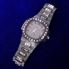 ELEVATE YOUR LOOK WITH THIS SPARKLY ICED OUT BAGUETTE WATCH. This iced out baguette watch will remind you of time while adding a touch of elegance to your outfit. It is made of 18K gold plated metal and tiny diamonds for a sparkly elegant appearance. Aside from that, it is also skin-friendly for an ultra-comfortable experience. SPECIFICATIONS Diamonds: Premium CZ Simulated Diamonds AAAA+ Premium 18K Gold Plating 5x Dial Window Material: Hardlex Band Width: 17mm Band Length: 8.38inch Case Thickne Black Diamond Watch, Bling Watch, Hip Hop Bling, Gold Plated Watch, Diamond Watches For Men, Diamond Ice, Mens Fashion Watches, Crystal Diamond, Watch For Men