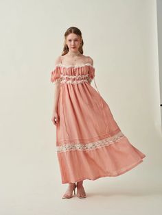 There is no doubt that this Fairy Linen dress will capture your heart.The lemon yellow and Sakura pink of the dress is a delightful and cheerful hue, reminiscent of sunlit meadows and warm, lazy days spent under the summer sun. The delicate lace edges are as light as feathers, adding a romantic touch to the overall des Flowy Lace Maxi Dress Feminine Style, Flowy Lace Trim Floor-length Maxi Dress, Flowy Floor-length Maxi Dress With Lace Trim, Breezy Maxi Dress With Ruffles, Flowy Lace Dress For Garden Party, Feminine Maxi Dress With Empire Waist For Garden Party, Pink Flowy Floor-length Midi Dress, Spring Breezy Floor-length Dress, Flowy Lace Dress With Lace Trim For Garden Party