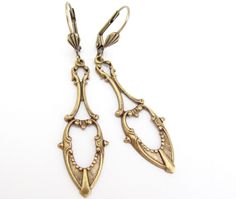 "Art Nouveau Earrings Antiqued golden brass Earrings. Fabulous long dangle Art Nouveau design earrings. Antiqued Brass, nickel free. Measure 2-1/4\" top to bottom. I am happy to switch to french ear wires or clip on if you prefer. Lever back design may vary. Dramatic Beauty...these can be worn every day to Wedding day! Sent to you with Aloha! More of my Artisan Jewelry: hawaiibeads.etsy.com" Dangle Art, Nouveau Earrings, Art Nouveau Earrings, Art Nouveau Earring, Earrings Chandelier, Deco Earrings, Earrings Art, Art Nouveau Design, Art Deco Earrings