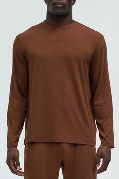 Available In Brown, Navy, Grey, Khaki and Black Crew Neck Long Sleeve 48% Cotton 47% Modal 5% Spandex Pair With "Essential Lounge Shorts" Pair With "Essential Lounge Pants" Imported | Mens Essential Modal Lounge Long Sleeve Tee Shirt in Brown size Small by Fashion Nova Relaxed Fit Basic Tops For Layering, Versatile Relaxed Fit Tops For Loungewear, Versatile Long Sleeve T-shirt, Versatile Brown Long Sleeve Top, Basic Brown Relaxed Fit Tops, Basic Brown Tops With Relaxed Fit, Basic Relaxed Fit Top For Loungewear, Brown Crew Neck Athleisure Top, Brown Crew Neck Top In Athleisure Style