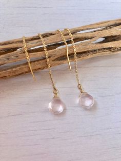 Rose Quartz Threader Earrings, Rose Quartz Modern Earrings, Pink Minimalist Chain Earrings, Dainty Pull Through Earrings, Boho, gift for her Rose Quartz teardrops suspended from 14k gold filled or sterling silver ear threaders. Ideal for a modern look, super clean and minimalistic earrings. Great choice of bridesmaids earrings they can continue to use on a daily basis. Stone Size: 8 mm Stone Shape: Teardrop Earring Length: 35 mm Material: Choice of 14k Gold Filled or Sterling Silver Gift Wrappin Teardrop Threader Single Earring As Gift, Hypoallergenic Dangle Rose Gold Threader Earrings, Hypoallergenic Rose Gold Dangle Threader Earrings, Pink Long Drop Earrings As Gift, Rose Gold Dainty Crystal Earrings For Pierced Ears, Dainty Single Linear Earring As Gift, Minimalist Rose Gold Linear Earrings For Gift, Minimalist Rose Gold Linear Earrings Gift, Rose Gold Dainty Crystal Earrings