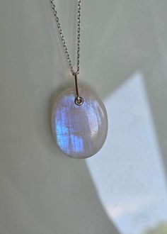 💥 💥 💥 Rainbow Moonstone pendant with sterling silver details. 🌸 Pendant, including bail: 33 mm x 22 mm/ 1.3" x 0.86" 🌸 All photos are  enlarged to better view the detailing of every item, please always check the measurements. ✓Because of the natural crystal structure, natural  gemstones could have some small visible scars and crackles. ✓ Solid 925 Sterling Silver (925 parts per 1000) ✓ 925 Silver Hallmarked ✓ Every natural stone is different and exclusive in pattern and shape, and with its Sterling Silver Moon Charm Necklace With Oval Pendant, Sterling Silver Oval Pendant With Moon Charm, Oval Moon Charm Jewelry Gift, Sterling Silver Jewelry With Large Oval Stone Pendant, Spiritual Oval Jewelry With Moon Charm, Sterling Silver Necklace With Large Oval Stone, Spiritual Sterling Silver Oval Necklace, Oval Sterling Silver Necklace With Large Stone, Handmade Oval White Gold Necklace