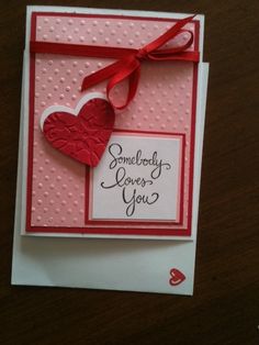 a handmade card with a heart on it