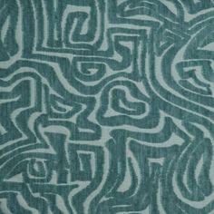 a green and white pattern on fabric