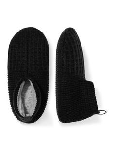 Crafted from extra-soft fabrics and finished with a cozy-lined interior, these slippers from Bombas feature stay-put grips and a cushioned footbed for added comfort. For every pair purchased, Bombas donates a pair to those in need. | Bombas Men's Waffle Gripper Solid Slippers, Black, Large Slippers Black, Easy Packing, Slippers Cozy, Cozy Interior, Slipper Socks, Make A Difference, Merino Wool, Waffles, Soft Fabrics