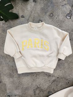 Cream colored embroidered graphic sweatshirt. Paris Sweatshirt, Dress Home, Lookbook, Graphic Sweatshirt, Size Chart, Paris, Cream, Sweatshirts, Clothes