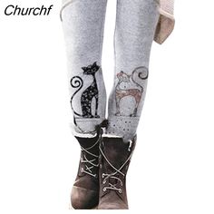 the legs of a person wearing boots and leggings with cats on them,