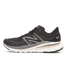 the new balance 890 running shoe in black and grey with white outstep