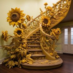 a spiral staircase decorated with sunflowers and vines