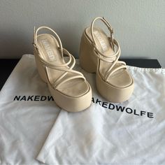 Naked Wolfe Mystery In Oat Size Eu 37 Us 7. Very Good Condition! True To Size, Could Also Fit 7.5 Id Say. Used Once Before Me, And I Wore Once To A Wedding. Slight Indents And Scuffs On Sides Of Shoe, Captured As Best I Could In Pics. Both Original Dust Bags Included, Coffee Stain On One Shown In Last Photo. Original Box Is No Longer Included. Price Reflects Imperfections, No Longer Sold On Website. Rare To Find In This Size And Condition, Grab While You Can! Sad To Let These Go But I Hope Someone Will Use Them More Than Me! #Futuristic #Cyber Naked Wolfe, Coffee Stain, Coffee Staining, Burning Man, Women's Pumps, Oats, Shoes Women Heels, A Wedding, Original Box