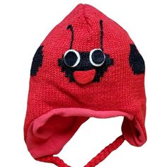 Wool Hat Lady Bug Design One Size Red Your Child Will Stay Warm And Look Adorable In This 100% Wool Hat Featuring A Lady Bug Design. This Quality Made Hat Features A Soft Fleece Lining, Ear Flaps, And Braided Ties For Security. Wool Hat Winter/Cold Weather Made In Nepal Hand Wash Size: Unisex Kids One Size Condition: New Nwot Item Lp774-A-2008-1of1 Red Knitted Cotton Hat, Warm Red Hat, One Size Fits Most, Red Cotton Knitted Hats, Red Warm Outdoor Hat, Warm Red Hat For Outdoor, Warm Red Outdoor Hat, Playful Adjustable Red Hat, Adjustable Red Hats For Playtime, Adjustable Red Hat For Playtime