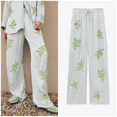 Zara New Pants. Embroidered Leaf Pants Satin Effect High Waist Pants With Adjustable Elastic Drawstring Waistband. Side Pockets And Back Patch Pockets. Embroidered Detail With Contrast Bead Appliqus. Trendy Wide Leg Bottoms With Floral Embroidery, Trendy Floral Embroidered Wide Leg Bottoms, Casual Pants With Floral Embroidery, Casual Wide Leg Pants With Floral Embroidery, Casual Wide-leg Pants With Floral Embroidery, Casual Floral Embroidered Trousers, Casual Floral Embroidered Pants For Fall, Wide Leg Pants With Floral Embroidery For Fall, Spring Embroidered Wide-leg Pants