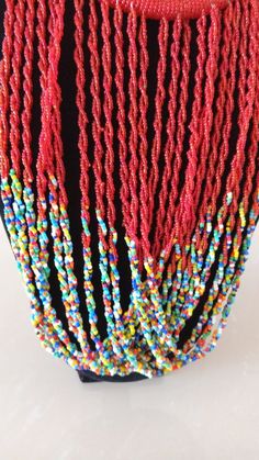 African Fringe Necklace, African Beaded Jewelry, Red Beaded Necklace, Tribal Jewelry, Women Necklaces, Mothers Gift, Chunky JewelryThis multi strand necklace is superbly crafted which makes you out stand in any occasion.Main Color - Red.Different colors are available.Feel free to send me a convo or e-mail for any clarification or more information.Thank you for visiting, Red Beaded Bracelet With Tiny Beads For Parties, Red Beaded Bracelets With Tiny Beads For Party, Red Tiny Beaded Bracelets For Party, Red Long Beaded Necklaces For Party, Long Red Beaded Necklaces For Parties, Red Long Beaded Necklace For Party, Red Polished Beads Beaded Necklace For Festival, Red Bohemian Beads With Beaded Chain, Red Beaded Chain For Festivals