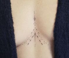 a woman's breast with arrows drawn on it