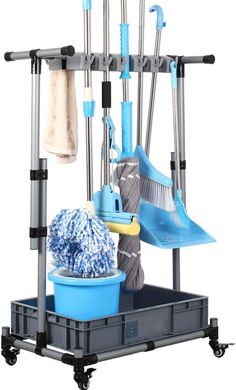 a rack with cleaning supplies and buckets on it, including a broom, mop, duster, and other items