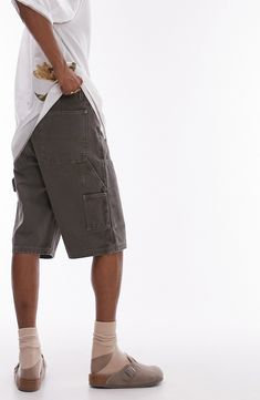 Get creative with your look in canvas shorts equipped with utility pockets and a carpenter loop for a vintage-inspired vibe. 11" inseam; 22" leg opening; 13" front rise; 15" back rise (size 32) Zip fly with button closure Front scoop pockets; coin pocket; back patch pockets; cargo patch utility pockets 100% cotton Machine wash, line dry Imported Utility Knee-length Shorts For Streetwear, Utility Bermuda Shorts In Cargo Style, Utility Cargo Style Bermuda Shorts, Utility Cargo Bermuda Shorts, Utility Bermuda Shorts With Side Pockets, Utility Bermuda Shorts With Pockets For Spring, Knee-length Utility Shorts With Side Pockets, Utility Bermuda Shorts With Cargo Pockets And Relaxed Fit, Utility Style Bermuda Shorts With Cargo Pockets, Relaxed Fit