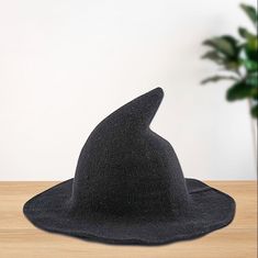 Step into enchanting style with our Ladies Black Wool Witch Hat! Whether you're dressing up for festivals or embracing a fashion-forward look, this versatile wool hat is the ultimate accessory. Crafted for warmth and comfort, it boasts a wired brim that can be shaped to suit your unique style. With its one-size-fits-most design, measuring approximately 20cm in height and 56-58cm in circumference, this hat is as practical as it is chic. The brim, approximately 7cm wide (please allow for minor dis Knitted Bat, Black Witches, Halloween Witch Costume, Witchcraft Decor, Black Witch Hat, Witch Halloween Costume, Witches Hat, Black Witch, Witch Costume