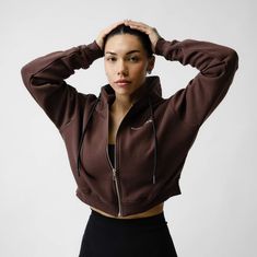 brown cropped hoodie main Fitted Cropped Athleisure Hoodie, Cropped Athleisure Sweatshirt For Streetwear, Adjustable Hood Sweatshirt For Gym In Fall, Cropped Winter Sports Activewear, Winter Cropped Athleisure Activewear, Sporty Cropped Hoodie For Fall, Gym Hoodie With Ribbed Cuffs, Fall Cropped Athleisure Activewear, Sportswear Hoodie For Gym