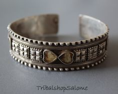 Vintage afghan unisex bracelet with heartshaped ornaments. Made of high grade silver with a beautiful patina. This bracelet is easily adjustable to arm circumference.  Weight 27 g, Width 17 mm  Silver quality 900 or higher Vintage Afghan, Unisex Bracelets, High Grade, Cuff Bracelets, Patina, Silver Bracelet, Jewelry Bracelets, Germany, Cuff