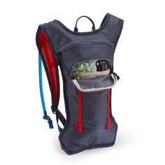 the back pack is filled with items and has two zippers on each side to keep it organized