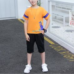 2-piece Cartoon Design T-shirt & Shorts for Boy - PrettyKid Casual Short Sleeve Playwear Set, Casual Summer School Sets, Orange Short Sleeve Sets For Spring, Casual Summer Short Set For Playwear, Sporty Short Sleeve Short Set For Summer, Sporty Short Set With Short Sleeves For Summer, Summer Short Sleeve Set With Letter Print, Playful Orange Summer T-shirt, Sporty Tops For School In Summer