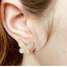 ♦ Gold Butterfly Stud ♦ Our boho earrings featuring a white iridescent butterfly is sure to capture attention when glistening in the sunlight, making them absolutely brilliant! ♦ White Butterfly Earrings ◇ MOP Earrings ◇ Wife Gifts ♦ Materials: White Shiny Shell * 14K Gold Plating ♦ Closure: Push Back OTHER ◇ INFORMATION ♦ Each pair is handcrafted with white shiny shell and plated in 14K gold. ♦ Our Mini Butterfly Stud Earrings are a brilliant way to show off your boho casual vibes. ♦ They make White Butterfly Shaped Pierced Earrings, White Pierced Butterfly Earrings, Nickel Free White Butterfly Earrings, Nickel-free White Butterfly Earrings, Delicate Nickel-free White Earrings, White Dainty Butterfly Earrings, Nickel-free White Plug Earrings As Gift, Nickel-free White Plug Earrings For Gift, Delicate White Nickel-free Earrings