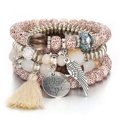 Four piece love wings charm cuff bracelet. A beautiful design combination of multiple bead types. Available in 5 different colors. Details Item Type: Fashion Bracelets Metal Type: Zinc Alloy Material: Wood,Bead,Cotton,Crystal Stile Boho Chic, Wrap Bangles, Friendship Bracelets With Beads, Brown Bracelet, Beaded Cuff Bracelet, Tassel Bracelet, Bohemian Bracelets, Crystal Beads Bracelet, Beaded Cuff