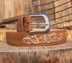 -Silver etched buckle -Floral embroidery -Genuine leather -COLOR BROWN Women Western Belt, Cowboy Belts Women, Western Engraved Belts For Rodeo, Western Style Engraved Belts For Rodeo, Engraved Western Belt For Ranch, Western Style Engraved Belt For Ranch, Western Embroidered Belt For Western-themed Events, Western Style Embroidered Belt, Engraved Adjustable Western Belt Buckles