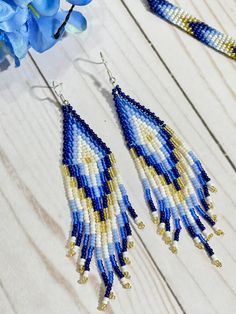 Blue Bohemian Tassel Earrings, Blue Bohemian Beaded Fringe Tassel Earrings, Blue Tassel Earrings With Round Beads, Blue Beaded Fringe Tassel Earrings For Festivals, Bohemian Blue Earrings With Fringe, Blue Fringe Earrings For Festivals, Blue Bohemian Earrings With Fringe, Bohemian Blue Fringe Tassel Earrings, Blue Fringed Beaded Earrings For Festival