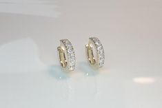 14K Solid Gold Chunky Diamond Hoops(F color SI) 14x 2mm diamonds approx 0.50ctw for pairOuter Diameter: 12mmInner Diameter: 8mmWidth: 2.5mmExpress Worldwide Shipping by FedEx, TNT, UPSShip in 5-7 business daysDelivery takes;US: 2-3 business daysEuropa: 1-3 business daysAustralia: 2-5 business daysCanada: 2-4 business daysUK: 2-3 business daysWorldwide: 2-6 business daysBold Diamond Huggies. Very special and versatile to wear with any combination.Perfect gift for you and your loved one.Boasting a Elegant Huggie Earrings With Single Cut Diamonds For Wedding, Wedding Huggie Earrings With Pave Setting, 14k Gold Huggie Earrings With Vvs Clarity For Wedding, 14k Gold Vvs Clarity Huggie Earrings For Wedding, Elegant White Huggie Earrings With Single Cut Diamonds, Luxury Brilliant Cut Huggie Earrings For Wedding, Elegant Wedding Huggie Earrings With Vvs Clarity, Elegant White Huggie Earrings With Diamonds, White Vvs Clarity Huggie Earrings For Formal Occasions