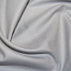 a close up view of a white fabric