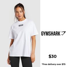 NEW KID ON THE BLOCK With bold Gymshark branding, style your Block pieces with anything and wear for your next training or rest day. • Comfy cotton fabric SIZE & FIT• Oversized fit• Model is 5'6" and wears size S MATERIALS & CARE• 100% Cotton SKU: B6A3Z-WB86 Cotton Athleisure T-shirt With Branding, White Workout T-shirt With Logo Print, Sporty Workout T-shirt With Branding, Sporty White Workout T-shirt, White Sporty T-shirt With Branding, Cotton Cropped T-shirt For Workout, Cotton Gym T-shirt With Logo Print, Graphic Print Cotton T-shirt For Training, White Letter Print T-shirt For Training