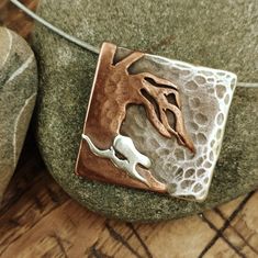 Made in hand beaten Oxidised Copper and Silver . approximately 1 inch  square. Worn as a necklace it comes with a memory wire necklace. Unique Soldered Square Pendant Necklace, Oxidised Copper, Mum Birthday, Wire Necklace, Winter Trees, Memory Wire, Moon Pendant, Brooch Pin, Brooches