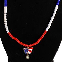 America Is Considered “The Greatest Country In The World” Because Of The Concept Of The American Dream And The Freedom That The Nation Offers. Show Your Love For This Great Country With This Patriotic Necklace. Red, White And Blue Seed Beads Surround This Stars And Stripes Enamel Butterfly On A Necklace Measuring @ 18.5 Inches. Multicolor Round Beads Jewelry For Independence Day, Red Patriotic Necklace For 4th Of July, Adjustable Blue Jewelry For 4th Of July, Patriotic Blue Beaded Necklaces, Adjustable Blue Patriotic Necklace, Patriotic Blue Beaded Necklace, Patriotic Round Beads Necklace Gift, Patriotic Round Beads Necklace As Gift, Blue Beaded Necklaces For 4th Of July