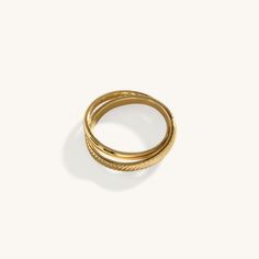 Introducing the Dual Band Ring, a modern and chic accessory crafted with precision and plated in radiant 18K gold. Featuring two bands elegantly intertwined, this ring adds a touch of sophistication to any outfit. Wear it alone for a minimalist look or stack it with other rings for added flair. With its versatile design and timeless appeal, the Dual Band Ring is sure to become a staple in your jewelry collection. Stainless Steel, plated with 18K Gold Waterproof (Tarnish Resistant) Natural Linen