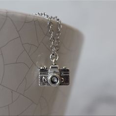 Perfect For Everyday Or A Gift To Give! Camera Necklace, Because A Picture Is Worth A Thousand Words. 16” Chain Lobster Clasp Small Everyday Necklace With Charms, Small Silver Necklaces With Charms, Silver Necklaces 16 Inch For Everyday, Vintage Adjustable Sterling Silver Charm Necklace, Adjustable Vintage Sterling Silver Charm Necklace, Vintage Sterling Silver Adjustable Charm Necklace, Vintage 16 Inch Necklace For Gift, Vintage 16-inch Necklace For Gift, Camera Necklace