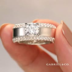 An eye-catchy ring setting with glittering round diamonds and a milgrain border💎 
Amos - 14K White Gold Round Diamond Wide Band Engagement Ring
ER14611R4W44JJ Divorce Ring Redesign, Resetting Diamonds Ideas, Wide Band Diamond Rings, Low Profile Engagement Rings, Wide Band Engagement Ring, Big Diamond Engagement Rings, Wide Wedding Rings, Gabriel Jewelry, Fancy Diamond Ring