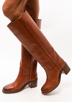 Isabel Marant's cognac boots are cut from smooth leather panels sewn with topstitching for an artisanal feel and set on a 2.5" stacked heel. Leather EU sizing ( EU size 37 translates to US size 7) Stacked heel Made in Portugal Runs true to size, we recommend taking your usual size. Knee High Cowboy Boots, Nike Shoes Women Fashion, Tall Brown Leather Boots, Cognac Boots, Fall Winter Shoes, Cowgirl Chic, Beautiful Boots, Gorgeous Shoes, Winter Shoes