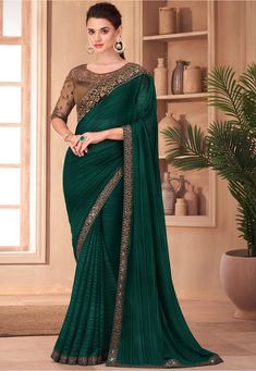 Faux Georgette Brasso Saree in Dark Teal Green Enhanced with Resham and Sequins Work Available with a Semi-stitched Art Silk and Net Blouse in Brown. Crafted in Round Neck and Half Sleeve Do note: Accessories shown in the image are for presentation purposes only. (Slight variation in actual color vs. image is possible). Satin Sari, Green Sarees, Saree Green, Sarees Silk, Dark Wedding, Satin Saree, Green Saree, Sari Blouse, Art Silk Sarees