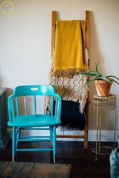 two chairs and a table in a room