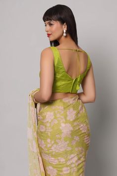 Introducing our enchanting Linda Lime Green Georgette Floral Sequins One Minute Saree – a kaleidoscope of style that's like a garden in full bloom. Imagine yourself wrapped in the vivid vibrancy of lime green georgette, adorned with delicate floral sequins that shimmer like morning dew on petals. The Ivory white cut dana tassels gracing the pallu's edges, adding a playful twist to your elegance. Completing this masterpiece is a raw silk blouse, featuring cap sleeves and a corset neckline, making Spring Green Saree With Floral Print, Spring Green Floral Print Saree, Green Floral Print Saree For Summer, Green Saree For Summer Party, Summer Green Floral Print Saree, Green Summer Saree, Green Summer Party Saree, Summer Party Green Saree, Bollywood Style Green Choli For Spring